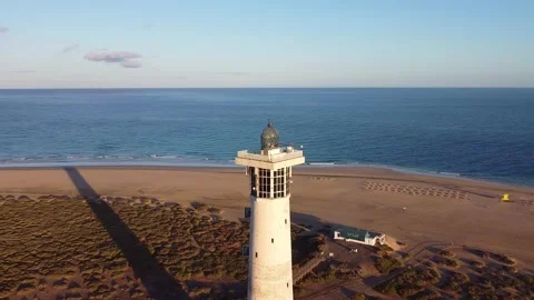 Drone rotation around lighthouse in Morro Jable, Fuerteventura, Spain Video stock 286361298