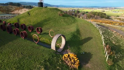 Drone Rotation Around Stone Circle and Rusting Machinery at St. Ninian's Stock Footage 273290107