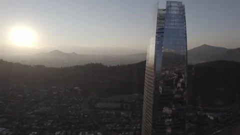 Drone Rotation Over Santiago de Chile With Sun Reflection And Backlight Stock Footage 345606476