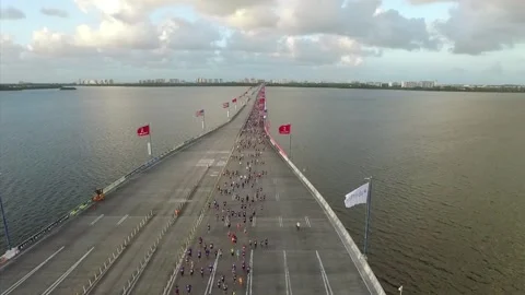 Drone Runners on Bridge Video stock 170574212
