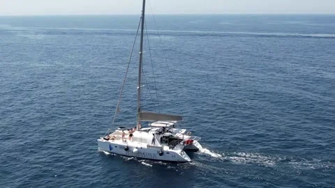 Drone Sails: Catamaran Elegance Unleashed Stock Footage 253780007