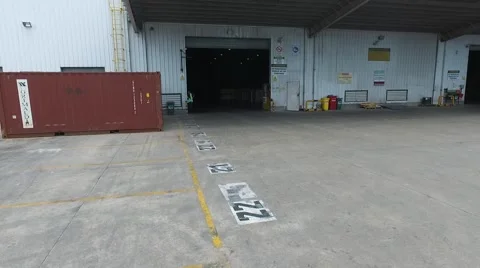 Drone scene entering an import export harbour deposit Vídeo Stock 59983356