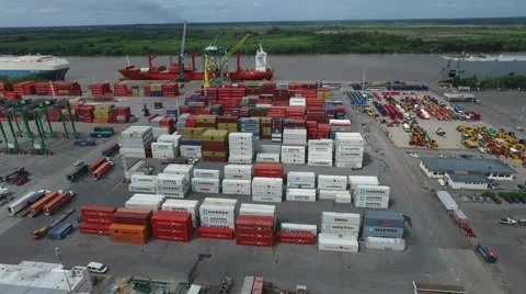 Drone scene over an import export harbour, Containers, cargo ship, cars and rive Vídeo Stock 62834544