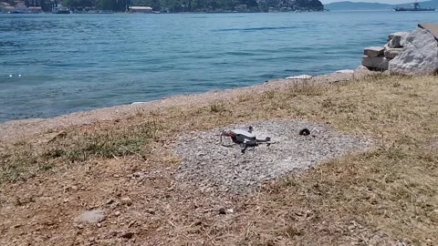 Drone on the seashore, preparing to fly, summer, sun Stock Footage 201778982