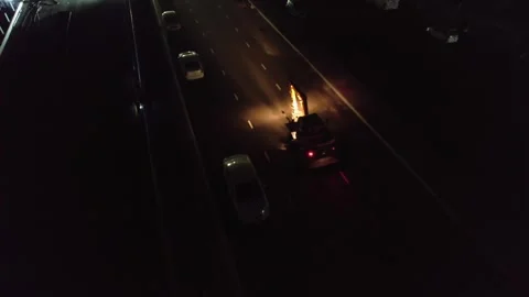 Drone on a section of a city road under repair at night Stock Footage 278784097