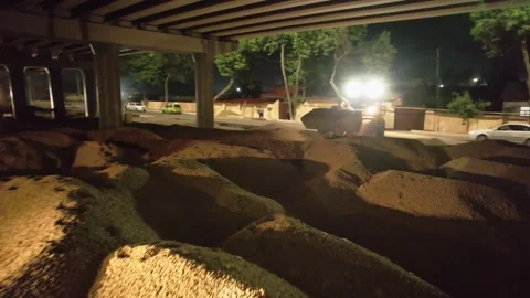 Drone on a section of a city road under repair at night Stock Footage 335464858