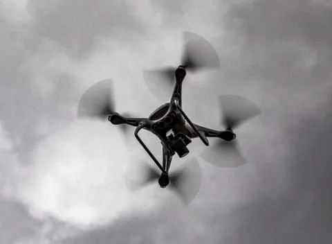 Drone is seen flying overhead Stock Photos
