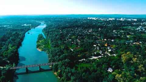 Drone shoot of a forest, river and city Stock Footage 94520332