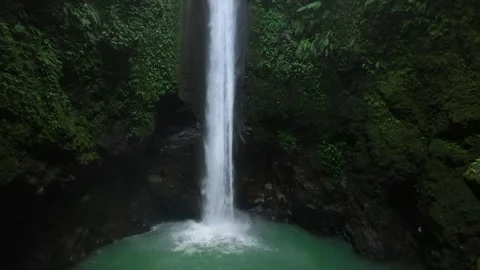 Drone shoot. Waterfall hidden in tropical rainforest jungle Stock Footage 242328594