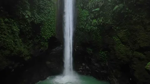 Drone shoot. Waterfall hidden in tropical rainforest jungle Stock Footage 246349687