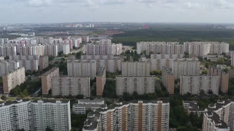 Drone shooting of a city with multi-storey buildings. Look up shot Video stock 142421632
