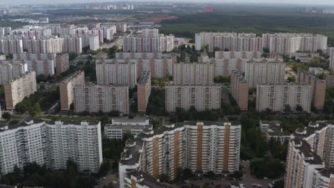 Drone shooting of a city with multi-storey buildings. Look up shot Video stock 142421648