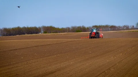Drone shooting during soybean sowing in the spring. Stock Footage 86491470