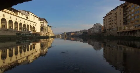 Drone shooting. Flight under the arch of famous Florence bridge Ponte Vecchio Video stock 121792210