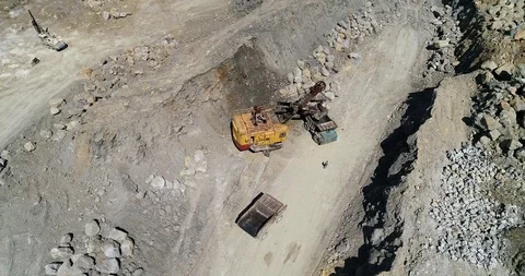 Drone Shooting Loading A Dump Truck At An Iron Ore Quarry Stock Footage 109924442