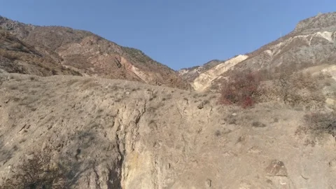 Drone shooting in mountainous terrain Stock Footage 145309197