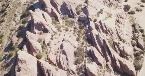 Drone shooting a ton of Creative looking Mountain Rocks Stock Footage 85591891