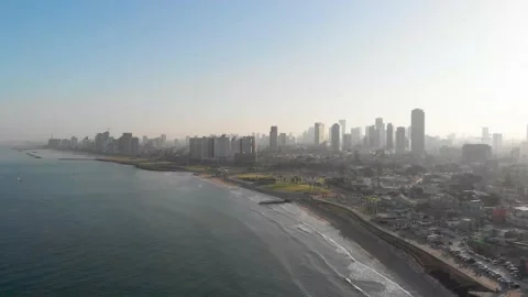 Drone shooting. We fly along the embankment of the city of Tel Aviv Israel Stock Footage 148424908