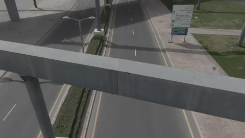 The drone shoots the movement of the car on a road Stock Footage 215544431