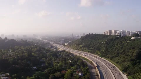 Drone shot of the 405 highway looking over Santa Monica in Los Angeles Stock Footage 135701529