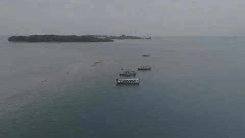 A drone shot about guy Jump from the top of the boat with an acrobatic movement Stock Footage 130427753