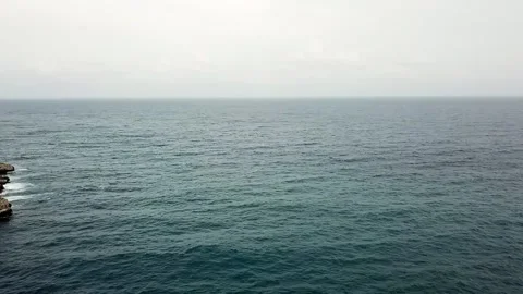 A drone shot from above of the bay of Cala Santany and the Mediterranean Se.. Stock Footage 315958769
