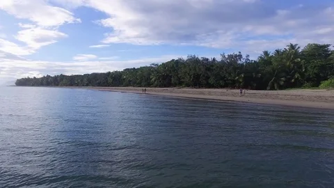 Drone shot above the beach blue water Stock Footage 80146067