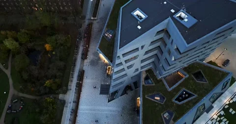 Drone shot of a abstract building Intressting architecture by a parc with Stockbeeldmateriaal 220817376