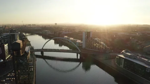 A drone shot across the river clyde with the Squigly Bridge Stock-Footage 132925424