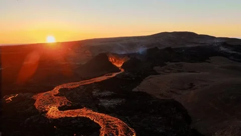 Drone Shot of Active Volcano With Lava River at Sunset Vídeo Stock 329273282