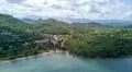 Drone shot aerial coastline beach and hills landscape of Flores - Indonesia Photo
