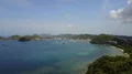 Drone shot aerial coastline hills and village landscape of Flores - Indonesia 4k or 4k+ Resolution