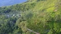 Drone shot aerial jungle mountains and village buildings beautiful Indonesia 4k or 4k+ Resolution
