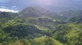 Drone shot aerial jungle mountains and village buildings beautiful Indonesia 4k or 4k+ Resolution