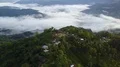 Drone shot aerial jungle mountains and village buildings beautiful Indonesia 4k or 4k+ Resolution