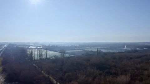 Drone shot aerial mavic 2 fly over a forest with sun reflection 動画素材 150291350