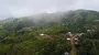 Drone shot aerial rainforest mountain clouds village Indonesia Flores 4k or 4k+ Resolution