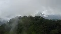 Drone shot aerial rainforest mountain clouds village Indonesia Flores 4k or 4k+ Resolution