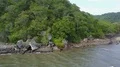 Drone shot aerial rocky coastline hills landscape of Flores - Indonesia 4k or 4k+ Resolution