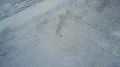 Drone shot aerial straight down snowy frozen farmland winter landscape 4k or 4k+ Resolution