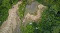 Drone shot aerial straight down descent jungle mountains rice fields Indonesia 4k or 4k+ Resolution