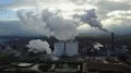 Drone shot aerial sugar factory with smoking chimney at sunny autumn day 4k or 4k+ Resolution