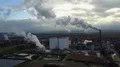Drone shot aerial sugar factory with smoking chimney at sunny autumn day 4k or 4k+ Resolution