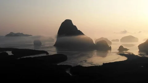 Drone shot of Aerial view of Samet Nangshe with sunrise in Phang nga. Stock Footage 129113741