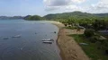 Drone shot aerial wild coastline beach and hills landscape of Flores - Indonesia 4k or 4k+ Resolution
