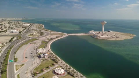 Drone Shot of Al Khobar Coastline and Water Tower Landmark in Saudi Arabia Stock Footage 334237432