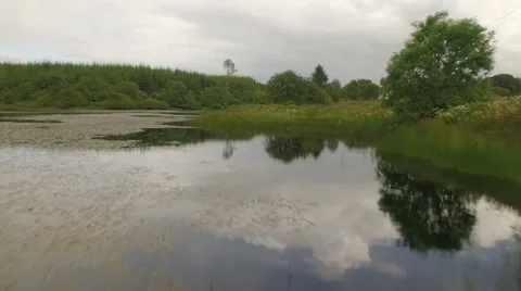 Drone shot along a loch in the Scottish highlands Stock Footage 62108163