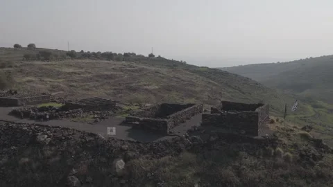 Drone Shot of the Ancient Basalt Synagogue at Korazim National Park Stock Footage 325432638