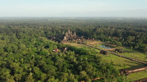 Drone shot of Angkor Wat during golden hour Stock Footage 246757380