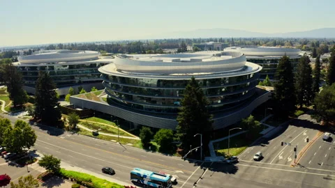 Drone shot of Apple wolf campus in San Jose showing the building and the Stock Footage 340021807